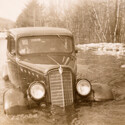 Car being towed through floodwaters in the Ossipee Valley, New Hampshire, 1936